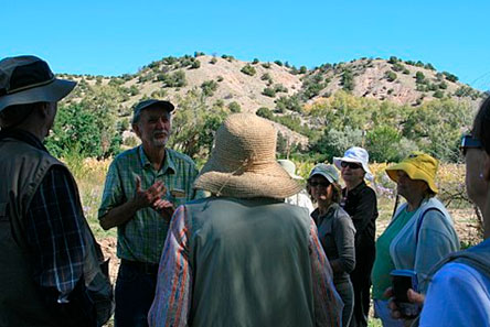 Stanley Crawford on the property of his garlic farm in Dixon, NM