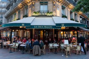 Photo of the entrance of Les Deux Magots Cafe in Paris