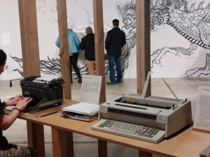 Denise Ahlquist Visitors could try out LeGuin’s original manual typewriter, or receive an automatically-printed poem from her electric one.